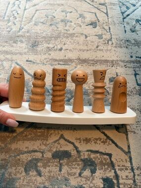 Lovevery wooden sensory emotion peg set
